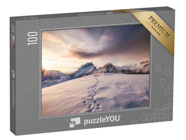 puzzle 100 dílků „Stopy ve sněhu při východu slunce v horách“